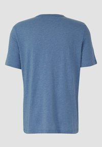 T-shirt bleu à manches courtes avec un col rond. Confectionné dans un matériau doux, présentant une texture chinée subtile et une coupe décontractée.