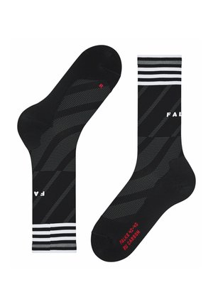 Zwarte crew-sokken met diagonale gestippelde strepen, witte strepen bij de manchetten en rode tekstbranding op de zolen en teengebieden.