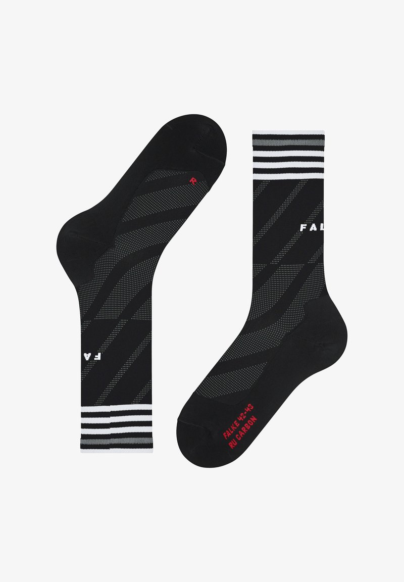 Chaussettes noires type crew avec des rayures diagonales en pointillés, des rayures blanches aux poignets et un marquage rouge avec texte sur les semelles et la zone des orteils.