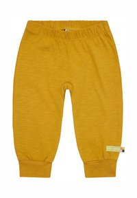 Gelbe Baumwoll-Jogginghosen mit einem gerippten Bund und Bündchen; verfügt über ein kleines Etikett an der Seite mit Markendetails. Glatte Textur.