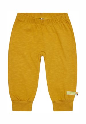 Geel katoenen joggingsbroeken met een geribde tailleband en boorden; voorzien van een klein label aan de zijkant met merkinformatie. Gladde textuur.
