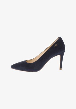 Marineblaue, spitz zulaufende High-Heel-Pumps aus Wildleder mit schlankem Absatz und kleinem goldfarbenem Dekorelement nahe dem oberen Rand.