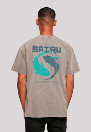 Gray cotton t-shirt featuring a fish graphic in teal and black on the back. Text below the graphic in a contrasting font. Short sleeves.