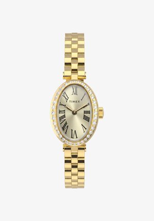 Montre-bracelet Timex en or avec cadran ovale, chiffres romains, lunette en cristal et bracelet métallique lié, affichant l'heure à 9h13.