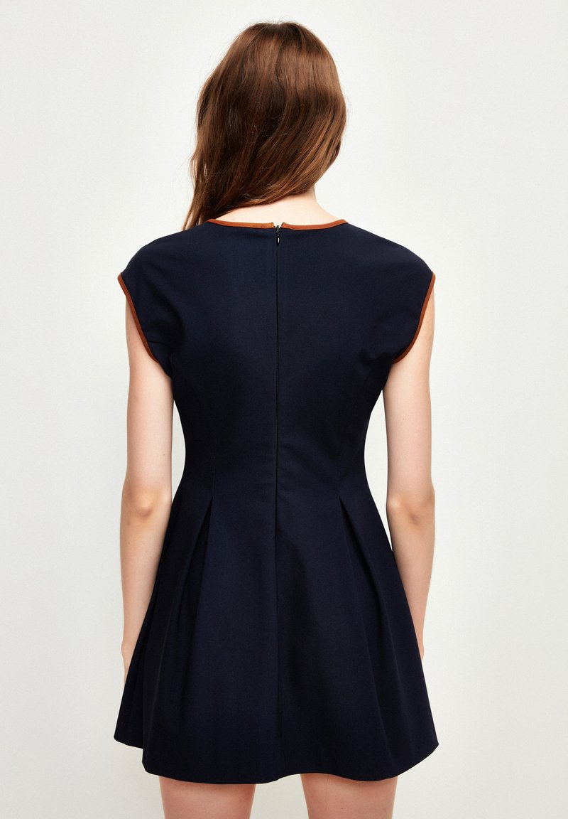 princess polly baby blue dress City Chic Cariline Mini Skater Dress in Navy main image 1