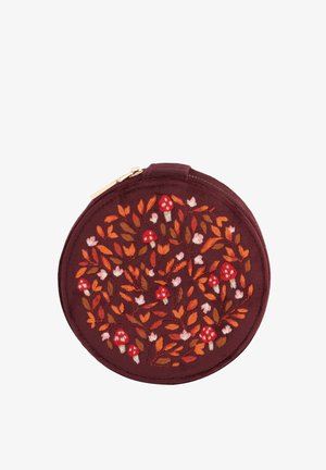Circular maroon pouch with embroidered floral and mushroom design in orange, red, and cream. Features a gold zipper and soft texture.