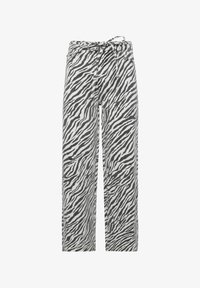 Pantalones de estampado de cebra en blanco y negro, con un corte holgado, cinturilla ajustable y una tela suave y texturizada.