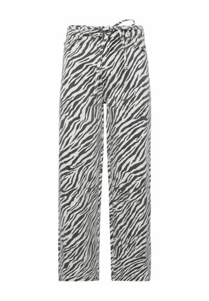 Juodos ir baltos zebro rašto kelnės, su laisvu kirpimu, reguliuojamu juosmeniu ir minkšta, tekstūruota medžiaga.