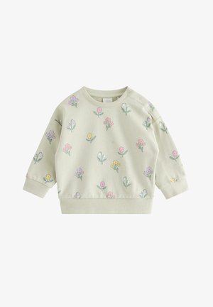 Lysebeige baby-sweatshirt med lange ærmer, dekoreret med farverige små blomsterprint og trykknapper på venstre skulder.
