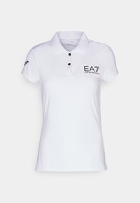Polo shirt bianco in cotone. Presenta un colletto, tre bottoni neri e un logo ricamato nero "EA7 Emporio Armani" sul petto.