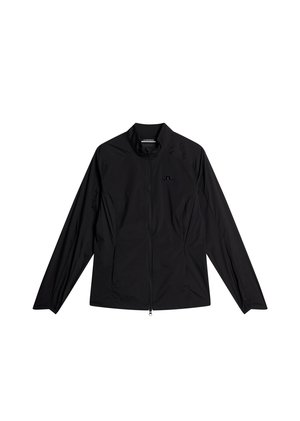 Veste légère noire avec fermeture éclair à l'avant, manches longues, col montant et logo de la marque discret sur la poitrine. Matériau lisse et résistant à l'eau.