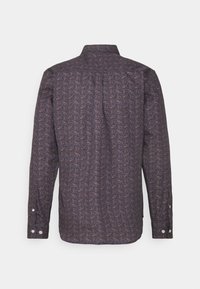 Langärmliges Hemd in Dunkelblau mit aufwendigem Paisleymuster. Verfügt über Knopfmanschetten und einen klassischen Kragen. Weicher Stoff mit subtiler Textur.