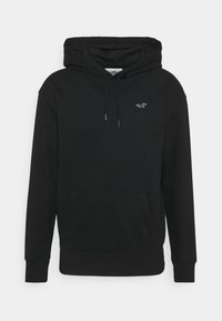 Schwarzer Pullover-Hoodie mit Kängurutasche, Kordelzugkapuze und kleinem weißen Vogel-Logo auf der linken Brust vor weißem Hintergrund.