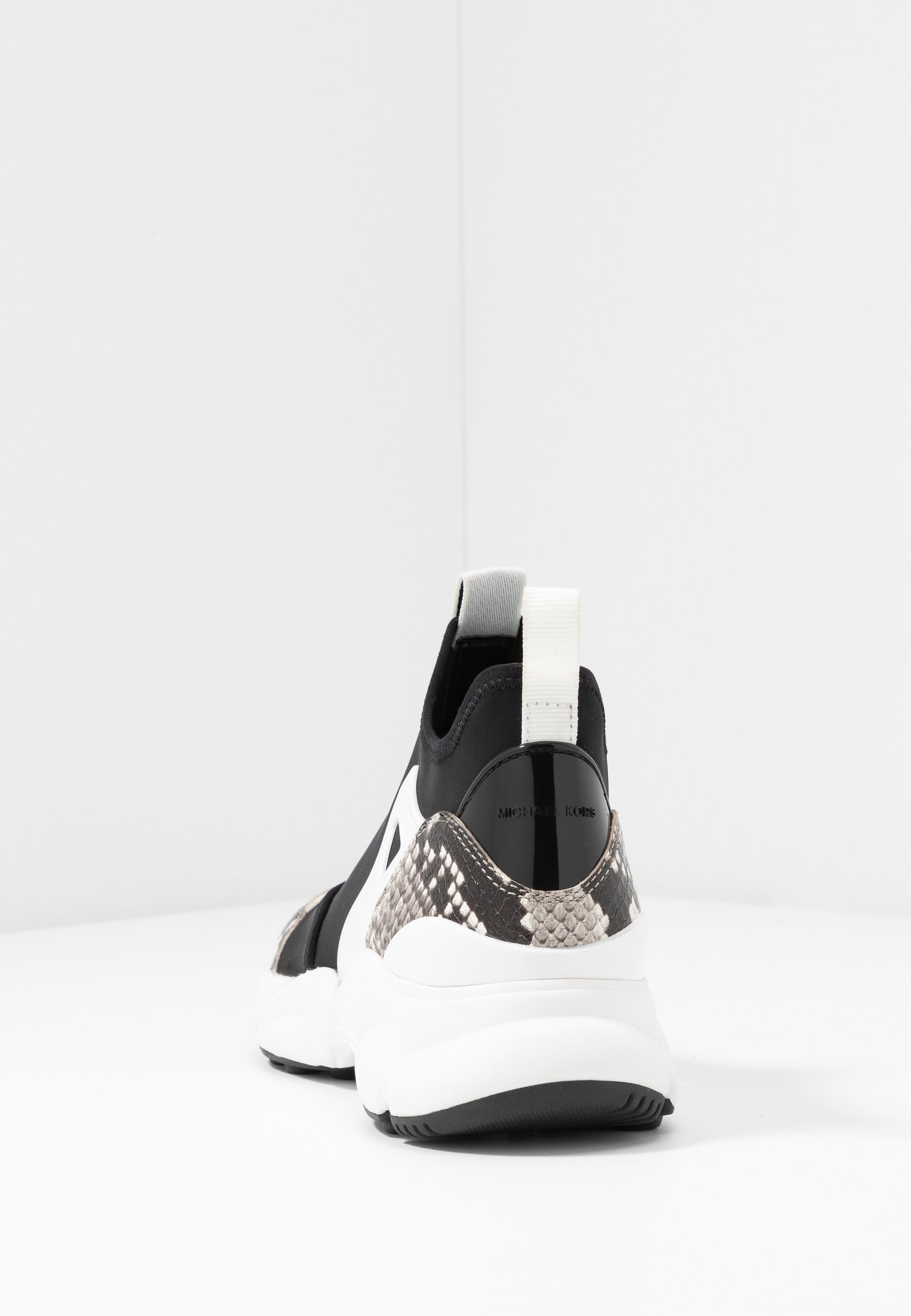 michael kors slip on white