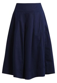 Marineblauwe, knielange rok met plooien en een aansluitende tailleband. Gemaakt van een gladde stof met een nette afwerking en zonder zichtbare hardware.