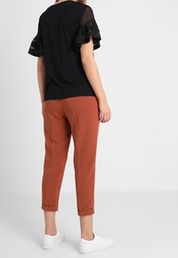 United Colors of Benetton Triko s potiskem - black