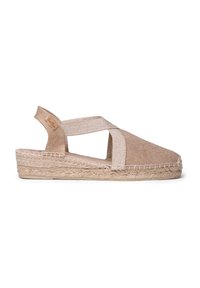 Beige espadrille dengan tali silang, terbuat dari kain anyaman dan sol jute. Memiliki tampilan tekstur dan desain yang ringan.
