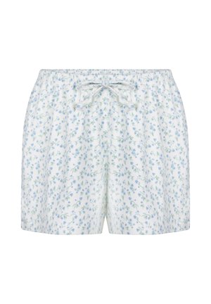White shorts with small blue and green floral print, elastic waistband, and front drawstring tied in a bow.