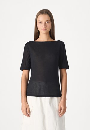 Black, short-sleeve top with a wide neckline. Made from lightweight, textured fabric. Smooth silhouette with a slightly loose fit.