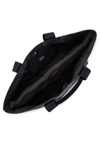 Borsa tote nera in tessuto, con doppie maniglie superiori, una tasca interna con zip e una finitura liscia e strutturata.