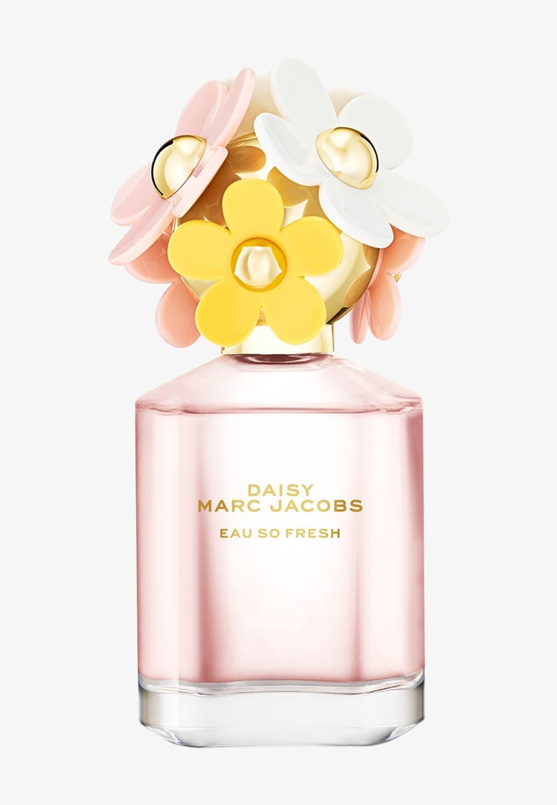 Bottiglia di profumo in vetro con liquido rosa pallido, testo dorato "Daisy Marc Jacobs Eau So Fresh" e tappo decorato con fiori in metallo e plastica.