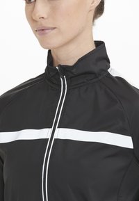 Endurance Runningjack - black
