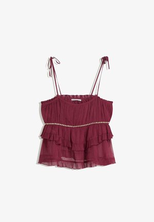 Burgundy spaghetti strap top with ruffled layers and a pearl bead accent along the waist. Made from lightweight, textured fabric.