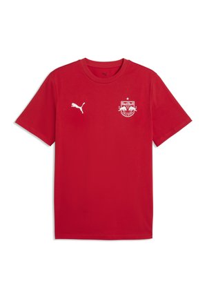 Maglietta rossa a maniche corte Puma con il logo della squadra di calcio Red Bull Salzburg sul petto sinistro e il logo bianco Puma sul petto destro.