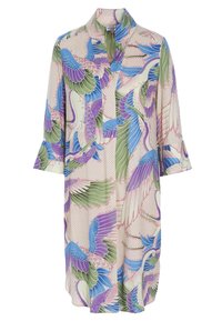 Tunic a maniche lunghe in tessuto leggero, con un motivo floreale e di uccelli multicolore in blu, verde e viola su uno sfondo chiaro.