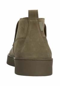 Stivaletti alla caviglia in suede marrone con una superficie liscia, pannelli laterali elastici e un'etichetta sul retro, dotati di una suola in gomma solida.