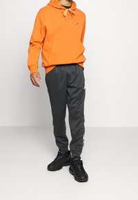 Nike Sportswear Luvtröja - ochre