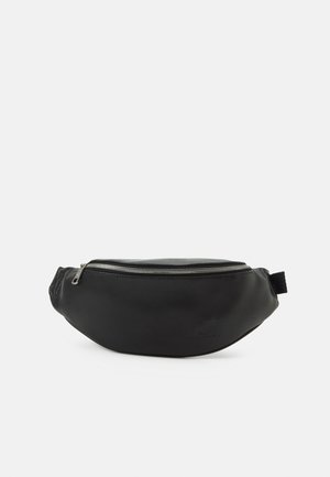 Black leather waist bag with a front zipper and subtle embossed logo, designed for hands-free carrying.