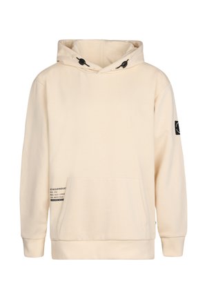 Felpa beige con coulisse, grande tasca frontale, polsini e orlo a coste. Presenta un'etichetta grafica sulla tasca. Tessuto morbido e testurizzato.