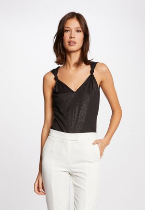 WITH WIDE STRAPS AND SPANGLES - Linne - black