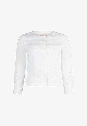 Veste courte blanche à manches longues avec encolure ronde, fermeture avant dissimulée, poches décoratives et broderie florale sur les manches.