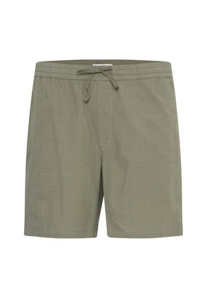 Olive green swim shorts made from a textured fabric. Features an elastic waistband with a drawstring and side pockets.