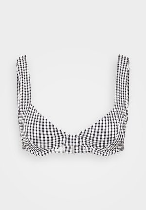 Czarnobiały biustonosz w kratę w stylu gingham z szerokimi ramiączkami, dekoltem w kształcie litery V i centralnym zapięciem na haczyk. Wykonany z teksturowanej tkaniny.