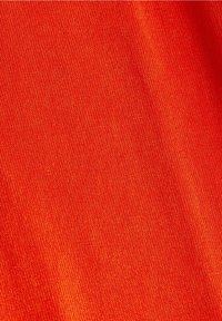 Red textile featuring a smooth, matte texture and fine, uniform weave. Bright color with no visible patterns or accents.