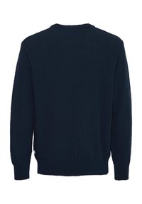 Maglione lavorato a maglia blu navy con maniche lunghe, collo rotondo, polsini e orlo a coste. Texture liscia, design semplice, senza motivi o accessori visibili.