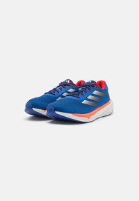 adidas Performance SUPERNOVA STRIDE - Road running shoes - blue/footwear white/team royal blue