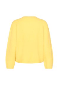 Pull tricoté ample jaune avec un col rond et des épaules tombantes, présentant une texture douce et un ourlet côtelé. Vue de dos affichée.