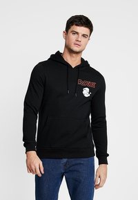 Pamut keverékből készült fekete kapucnis pulóver, elöl kenguru zsebbekkel, állítható húzózsinórral és a mellkason található Popeye grafikával.