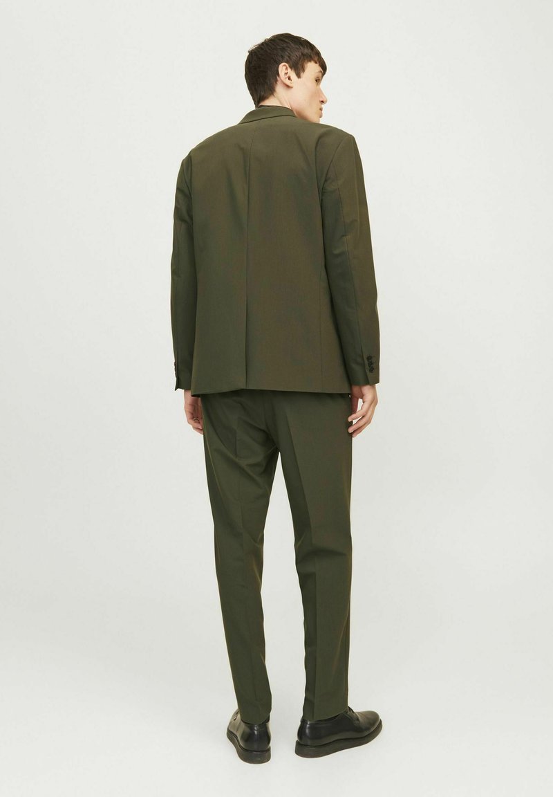 Green Suit trousers online at ZALANDO