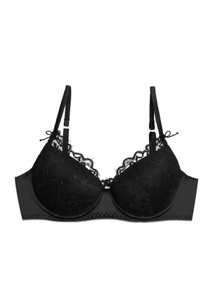 Black bra with padded cups, delicate floral lace overlay, and adjustable straps. Features lace trim and small bows at the front.