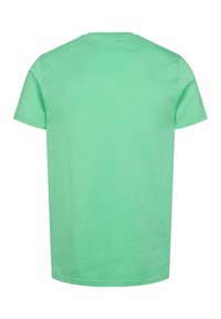 Lühikese varrukaga t-särk mündirohelises värvitoonis. Valmistatud pehmest puuvillast, ümar kaelus. Sile tekstuur, ilma nähtavate logode või kujunditeta.