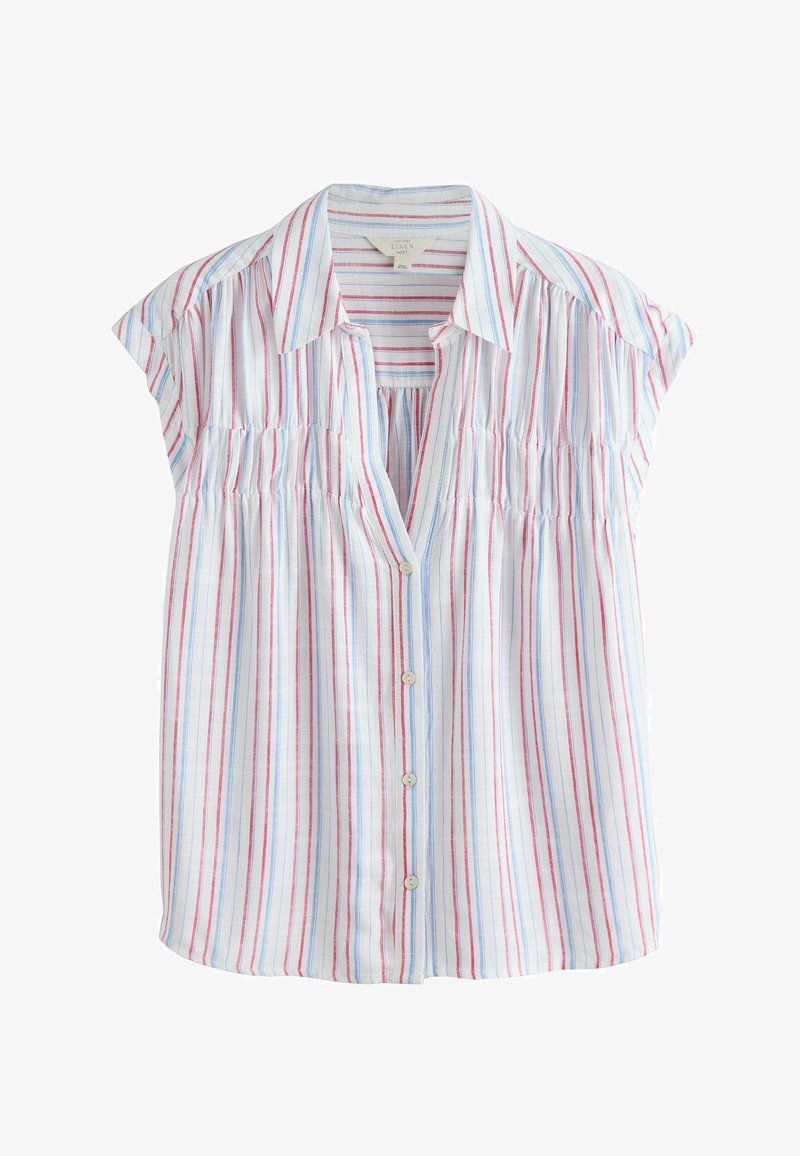 Blouse blanche sans manches avec des rayures verticales rouges et bleues, fermeture boutonnée à l'avant et col pointu.