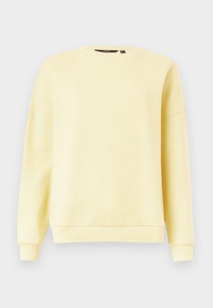Langärmeliges Sweatshirt mit Rundhalsausschnitt in hellem Gelb mit gerippten Bündchen an Ärmeln und Saum, vor einem schlichten hellen Hintergrund präsentiert.