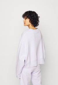 Nike Sportswear TREND CREW OVERSIZED - Camisola - pure violet