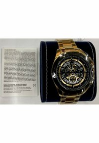 Goldfarbene Metalluhr mit schwarzem Zifferblatt, mehreren Unterzifferblättern und lumineszierenden Markierungen. Verfügt über ein armband aus rostfreier Stahl und ist wasserdicht.