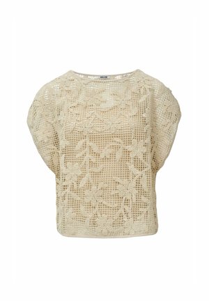 Haut en dentelle beige avec un motif floral. Coupe ample, encolure ronde, manches courtes et surface texturée. Matière légère et respirante.